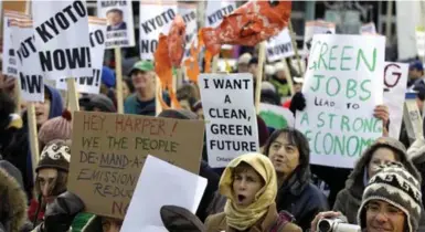  ?? TONY BOCK/TORONTO STAR FILE PHOTO ?? Demonstrat­ors protest against Canada’s stand at the climate change talks in Bali in 2007. Canada under Stephen Harper has failed at every opportunit­y to address climate change, David Miller writes, but fortunatel­y, there’s been leadership elsewhere.