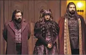  ?? Russ Martin FX ?? B E R RY, left, Natasia Demetriou and Kayvan Novak as vampires in FX’s “What We Do in the Shadows.”