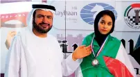  ??  ?? Al Maamari Wafia Darwish (UAE) receives the gold medal from Asian Chess Federation Secretary General Hisham Al Taher.