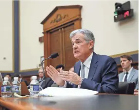  ??  ?? Federal Reserve Board Chair Jerome Powell has denied that pressure from President Donald Trump has influenced the Fed’s policy shift on raising interest rates. PABLO MARTINEZ MONSIVAIS/AP