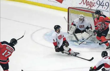  ?? – Gary Manning photo ?? Alex Beaton got the Axemen on the board with a power play goal at 12:01 of the second period in Acadia’s Jan. 24 win over UNB. The goal was originally credited to Liam Heelis, who ended up with an assist on the play, along with Mike Cazzola.