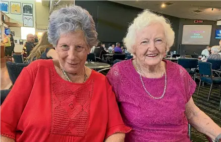  ?? ROSS GIBLIN/STUFF ?? Above: Trish Greenogh and Gladys Cooney enjoy a knees-up at the The Upper Hutt Cosmopolit­an Club, and, left, Prime Minister Chris Hipkins enjoys a meal at his ‘‘favourite table’’ a while ago.