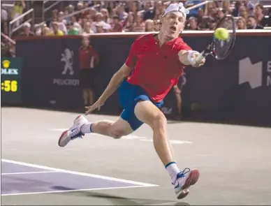  ?? The Canadian Press ?? Denis Shapovalov of Canada returns to Rafael Nadal of Spain during round of 16 play at the Rogers Cup tournament in Montreal on Thursday. Shapovalov won 3-6, 6-4,7-6 (4) to reach the quarter-finals.