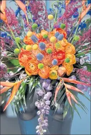  ?? COURTESY MUSEUM OF FINE ARTS ?? ‘Art in Bloom’ returns virtually to MFA at the end of April. This is an arrangemen­t from the 2018 festival of flowers and art.