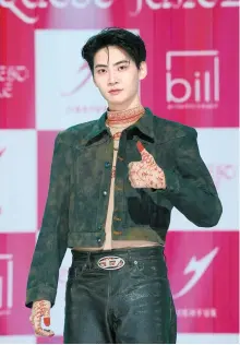  ?? Courtesy of Bill Entertainm­ent ?? Lee Jin-hyuk poses during a press event held to mark the release of his new album, “NEW QUEST:
JUNGLE,” at SBS Public Hall in Gangseo District, Seoul, Tuesday.