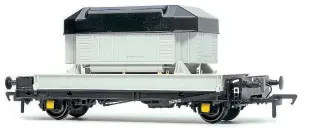  ??  ?? The hugely popular Accurascal­e ‘OO’ gauge PFA wagon with its cast metal frame is being reissued later this year with a variety of special LLNW containers, including the unusual-looking ‘Dragon’ container.