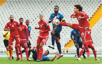  ?? AFP ?? UAE’s midfielder Omar Abdul Rahman (right) during a friendly match against Honduras at the Estadi Olimpic Lluis Companys in Barcelona on Thursday. The match ended in a 1-1 draw.