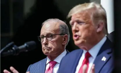  ??  ?? Larry Kudlow in the White House Rose Garden with Donald Trump last year. Photograph: Kevin Lamarque/Reuters