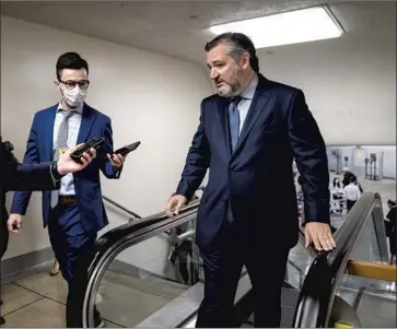  ?? Kent Nishimura Los Angeles Times ?? SEN. TED CRUZ, right, pictured this month, has held back as many as two dozen State Department appointees. “These are critical national security positions,” Secretary of State Antony J. Blinken said last week.