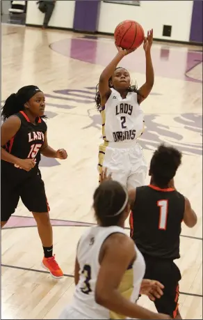  ?? Terrance Armstard/News-Times ?? Shoot the J: Junction City's Bryanna Raye goes up for a jump shot against Warren during Dual State action recently. The Lady Dragons host Monticello today, beginning with junior high at 5 p.m.