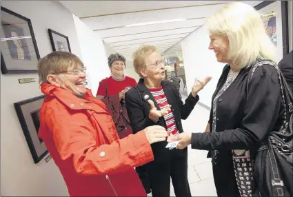  ?? STAN CARROLL/THE COMMERCIAL APPEAL ?? Holly Swogger (right), president of West Tennessee Veterans Home Inc., celebrates Wednesday with supporters Candi Schoenberg­er (from left), Sally Harrison and Janice Vanderhaar after the charitable organizati­on was awarded a total of $145,000.