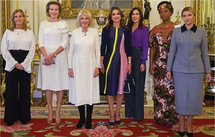  ?? ?? Campaigner­s: From left, the Countess of Wessex, Queen Mathilde, Camilla, Queen Rania, Crown Princess Mary and first ladies Fatima Maada Bio and Olena Zelenska