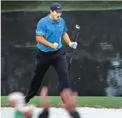  ?? PHOTO: REUTERS ?? Patrick Reed of the US celebrates chipping in for an eagle on the 15th hole during third round play of the 2018 Masters golf tournament at the Augusta National Golf Club in Augusta, Georgia, on Saturday