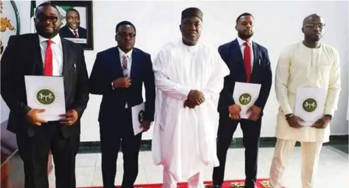  ??  ?? Governor of Enugu State, Ifeanyi Ugwuanyi (middle) flanked by Mr. Anthony Chukwudube­m Onyia (left) Mr Michael Ogbuekwe, Mr. Anthony Ikenna Nwodo and Mr. Arinze Chilo-Offiah after their swearing in Government House Enugu as special advisers to the governor