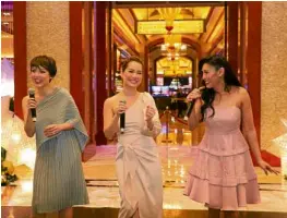  ??  ?? Entertaine­rs Cris Villonco, Shiela Valderrama and Carla Guevarra; and (left) Thomas Arasi, Solaire president and chief operating officer
