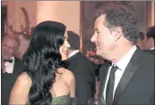  ?? ANDREW HARRER — BLOOMBERG ?? Television host Piers Morgan with singer Katy Perry at a 2013 event in Washington, D.C. The former CNN host shamed actor Daniel Craig for wearing a baby carrier.