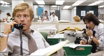  ?? WARNER BROS ?? Robert Redford (left) as Bob Woodward and Dustin Hoffman as Carl Bernstein in The checks and balances the constituti­on was designed to create functioned when put to their biggest test. Would they still?