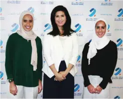  ??  ?? Loulwa Al-Ayoubi from Burgan Bank poses with Najla Al-Jeraiwi and Noura Al-Hajeri.