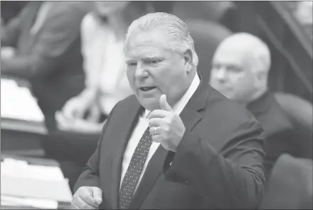  ?? CP PHOTO ?? Ontario Premier Doug Ford attends Question Period at the Ontario legislatur­e in Toronto on Wednesday.