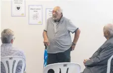  ??  ?? Ngāti Ranginui kaumātua Tu Pearson (standing) and Des Tata (seated right) officiated the opening of the Covid-19 Vaccinatio­n Centre in 1st Avenue with a whakatau. PHOTO: Supplied.