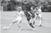  ?? PROVIDED ?? Orlando Pride defender Phoebe McClernon battles with Florida State forward Kristen McFarland for the ball in a preseason scrimmage.