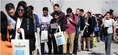  ?? - Reuters file picture ?? JOB ASPIRANTS: There were hefty increases in leisure and hospitalit­y, healthcare and social assistance as well as business and profession­al services payrolls.