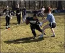  ?? COURTESY PHOTO ?? Greater Lowell Tech flag football player Reynajane Javier looks for an opening during a recent practice.