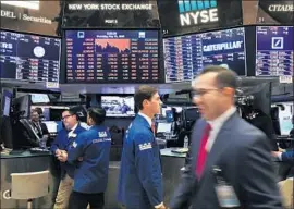  ?? Spencer Platt Getty Images ?? ALLOWING an advisor to make trades in your account is risky, and trying to beat the market with frequent trades is usually futile, and costly. Above, the NYSE.
