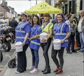  ?? Photo by Pakie O’Donoghue. ?? A group of glamorous ladies about to go on collection duty as the Mick O’Regan Memorial Run made its way through Buttevant.