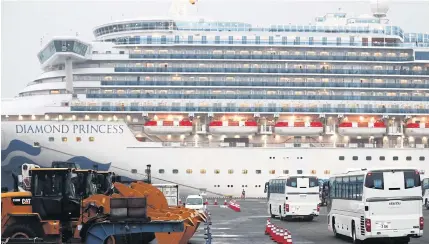  ?? AFP ?? Buses arrive next to the ‘Diamond Princess’ cruise ship, with people quarantine­d onboard due to fears of the coronaviru­s in Yokohama, Japan yesterday.