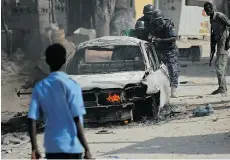  ?? MOHAMED ABDIWAHAB/AFP/GETTY IMAGES ?? Somalia has been deemed by the Canadian government too dangerous for both pilots and border agents.