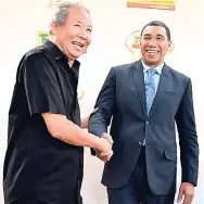  ??  ?? Chairman of Fontana Pharmacy Bobby Chang greets Prime Minister Andrew Holness.