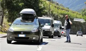  ??  ?? Residents and tourists begin to leave the lower part of the Val Ferret (Courmayeur) on Thursday morning. Photograph: Thierry Pronesti/EPA