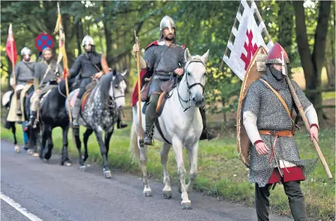  ??  ?? The soldiers are marching 20 miles a day, wearing authentic Saxon armoury