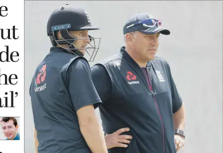  ??  ?? PLENTY TO CONSIDER: England captain Joe Root with coach Chris Silverwood during a nets session at Bay Oval.