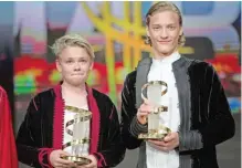  ??  ?? Island’s actor Blaher Hinriksson (right) and Denmark’s actor Baldur Einarsson hold their trophy after receiving the best actor award.