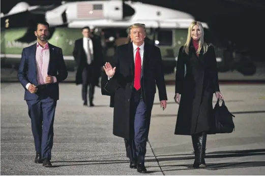  ?? MANDEL NGAN/AFP VIA GETTY IMAGES ?? Then-President Donald Trump, with Donald Trump Jr and Ivanka Trump, on Jan. 4, 2021.