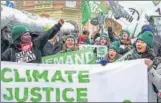  ?? AFP PHOTO ?? Climate change protesters outside the venue of the COP24 summit in Katowice, Poland, on Saturday.