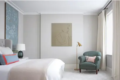  ??  ?? MASTER BEDROOM A delicate hand-painted chinoiseri­e panel sets a serene mood.
Wall panel, de Gournay.
Table lamp, Tyson Lighting.
Artwork, Ed Hodgkinson.
Floor lamp, Visual
Comfort & Co