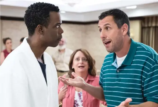  ?? NETFLIX ?? Kirby ( Chris Rock, left) is the father of the groom about to marry the daughter of Kenny ( Adam Sandler) in “The Week Of.” Rachel Dratch is caught in the middle.