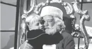  ?? Walt Disney Television ?? Cindy ( Susan Olsen) begs Santa Claus ( Hal Smith) to make her mother well in “The Brady Bunch.”