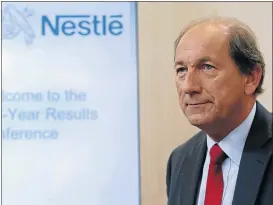  ?? Picture: REUTERS, DENIS BALIBOUSE ?? SOLID RESULTS: Nestlé CEO Paul Bulcke arrives for the full-year 2014 results conference yesterday. Nestlé forecast sales to rise 5% this year.