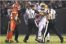  ??  ?? Marshawn Lynch was ejected for unsportsma­nlike conduct in the second quarter after making contact with an official.