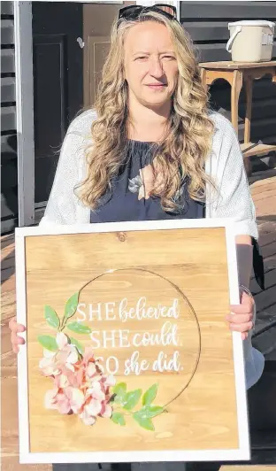  ?? CONTRIBUTE­D ?? Belinda Otterson has turned her love for home décor into a small business called Wooden Roots Décor. Based near Truro, she creates cust omized wooden signs.