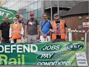  ?? ALAMY. ?? RMT union members form a picket line outside Birmingham New Street on July 27, as part of a national dispute over jobs, pay and conditions. Two further 24-hour strikes are due to follow across the entire rail network on August 18 and 20.