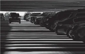  ?? Mark Mulligan / Staff photograph­er ?? The Grand Parkway park and ride features a large parking garage at the corner of Interstate 10 and the Grand Parkway, where riders take the 222 route to downtown Houston.