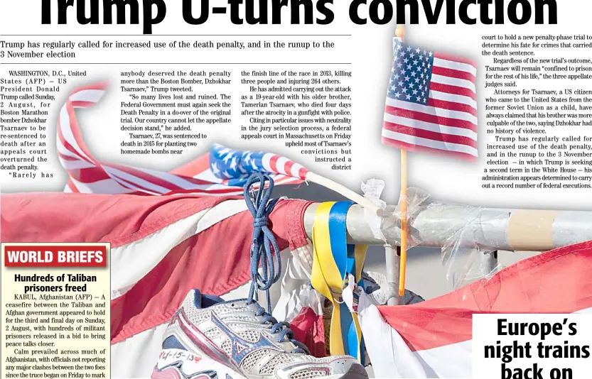  ?? DON EMMERT/AGENCE FRANCE-PRESSE ?? IN this file photo, a running shoe and US flag are part of a memorial on the Boston Marathon route in Boston.