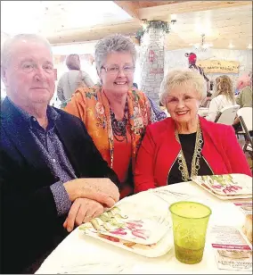  ?? COURTESY PHOTO ?? Sam Alps (center), visits with Jim and Sue Morgan at the McDonald County Historical Society Banquet at the River Ranch Resort. Volunteers celebrated preserving McDonald County history and raising critical operations funds.