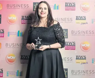  ??  ?? Kimberley Oliver, who started Xenith Financial Consulting, with her coveted award