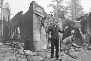  ?? CHRISTOPHE­R CHUNG/ASSOCIATED PRESS ?? California Gov. Gavin Newsom speaks at a news conference Thursday at Foothills Elementary School while touring areas damaged by the Glass Fire near St. Helena, Calif.